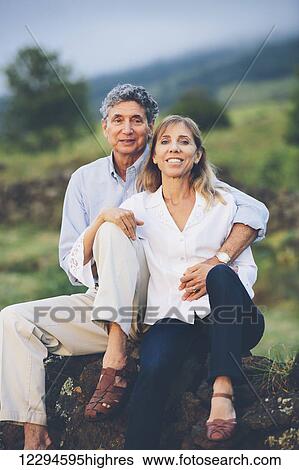 Happy loving middle aged couple View Large Photo Image Stock Photograph - Happy loving middle aged couple. Fotosearch