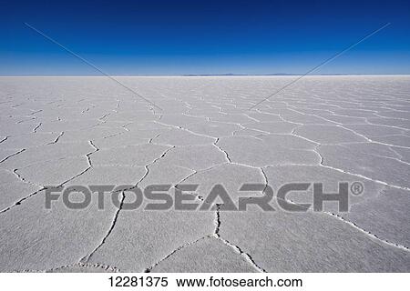 Stock Photography - Hexagon patterns on the salt flats of Salar de Uyuni; Bolivia. Fotosearch