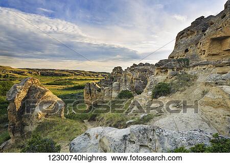 Hoodoos in the Badlands overlooking the Milk River, Writing-on-Stone Provincial Park; Alberta, Canada View Large Photo Image Stock Photograph - Hoodoos in the Badlands overlooking the Milk River, Writing-on-Stone Provincial Park; Alberta, Canada. Fotosearch