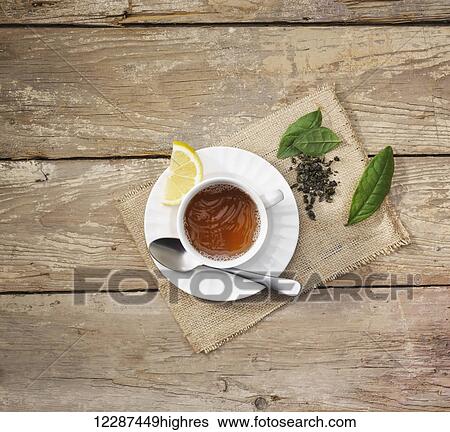 Stock Photograph - Hot tea with lemon and mint; Toronto, Ontario, Canada. Fotosearch