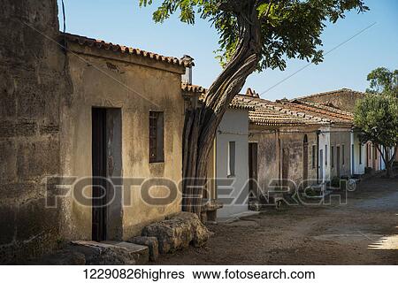 Houses in a village of medieval origin; San Salvatore di Sinis, Sardinia, Italy View Large Photo Image Stock Photograph - Houses in a village of medieval origin; San Salvatore di Sinis, Sardinia, Italy. Fotosearch