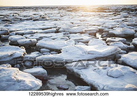 Ice chunks on a beach in Homer, Southcentral Alaska View Large Photo Image Stock Photograph - Ice chunks on a beach in Homer, Southcentral Alaska. Fotosearch
