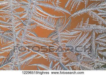 Stock Photograph - Ice crystals on a window; Whitehorse, Yukon, Canada. Fotosearch