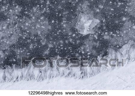 Stock Photograph - Ice crystals on ice; Manitoba, Canada. Fotosearch