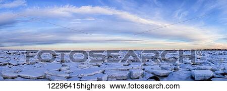 Ice forms on the shores of Hudson Bay as sunset starts to light up the clouds; Churchill, Manitoba, Canada View Large Photo Image Stock Photograph - Ice forms on the shores of Hudson Bay as sunset starts to light up the clouds; Churchill, Manitoba, Canada. Fotosearch
