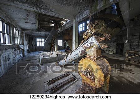 Stock Photograph - Inside the old abandoned herring factory; Djupvik, Iceland. Fotosearch