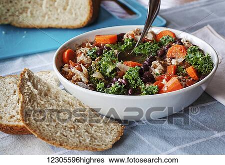 Kale and black bean soup with homemade bread; British Columbia, Canada View Large Photo Image Stock Photograph - Kale and black bean soup with homemade bread; British Columbia, Canada. Fotosearch