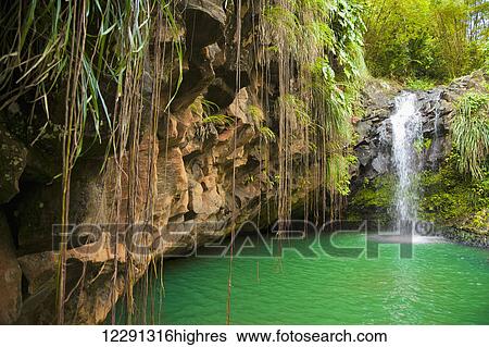 Stock Photograph - Lagoon with small waterfall, Annandale Falls; St. Georges, Grenada. Fotosearch