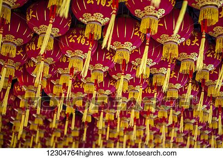 Stock Photograph - Lanterns at the Kek Lok Si Temple, Chinese New Year's in Malaysia is celebrated with paper lanterns hung on ceilings and walls throughout Chinese neighborhoods and businesses in Malaysia; Georgetown, Penang, Malaysia. Fotosearch