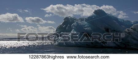 Large Blue Ice Formation Along The Coast Of The Arctic Ocean; Spitsbergen, Svalbard, Norway View Large Photo Image Stock Photograph - Large Blue Ice Formation Along The Coast Of The Arctic Ocean; Spitsbergen, Svalbard, Norway. Fotosearch