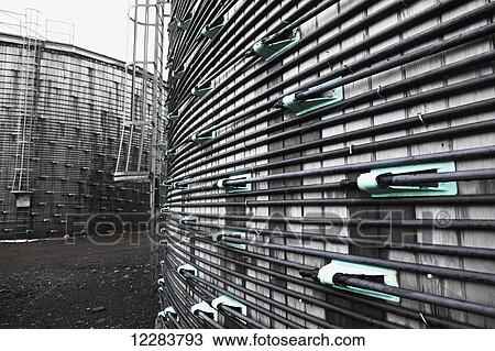 Large wood holding tanks secured by cable bands, St. Paul Island, Southwestern Alaska, USA, Summer View Large Photo Image Stock Image - Large wood holding tanks secured by cable bands, St. Paul Island, Southwestern Alaska, USA, Summer. Fotosearch