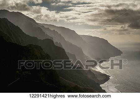 Stock Photograph - Late afternoon view of the Na Pali Coast; Kauai, Hawaii, United States of America. Fotosearch