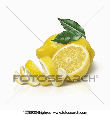 Lemon and a twist of lemon peel with leaf garnish on a white background; Toronto, Ontario, Canada View Large Photo Image Stock Photograph - Lemon and a twist of lemon peel with leaf garnish on a white background; Toronto, Ontario, Canada. Fotosearch