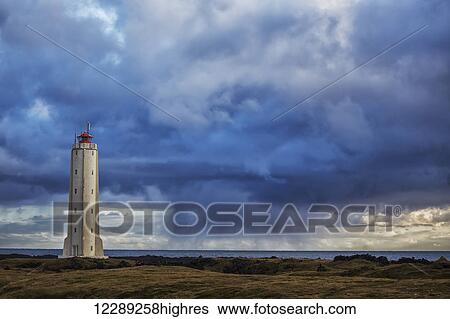 Lighthouse known as Malarrif on the Snaefellsness Peninsula with rain squall falling in the background; Iceland View Large Photo Image Stock Photograph - Lighthouse known as Malarrif on the Snaefellsness Peninsula with rain squall falling in the background; Iceland. Fotosearch