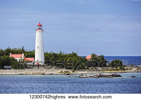 Stock Photograph - Lighthouse on Cove Island, Fathom Five National Marine Park, Georgian Bay, Lake Huron; Ontario, Canada. Fotosearch