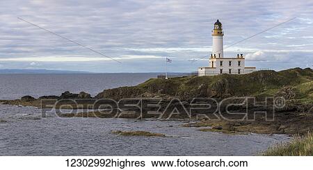 Stock Photograph - Lighthouse on the coast; Maidens, Ayrshire, Scotland. Fotosearch