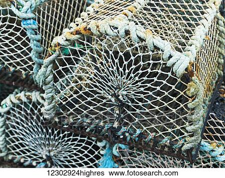 Stock Photograph - Lobster traps; John O'Groats, Scotland. Fotosearch