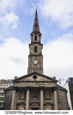 Stock Photograph - Low angle view of a building with a clock tower; Edinburgh, Scotland. Fotosearch
