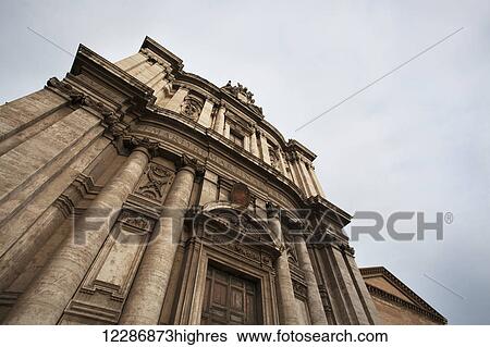 Stock Photograph - Low angle view of a building with columns on the facade; Rome, Italy. Fotosearch