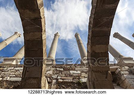Low angle view of ancient ruins with columns and arches; Smyrna, Turkey View Large Photo Image Stock Photograph - Low angle view of ancient ruins with columns and arches; Smyrna, Turkey. Fotosearch