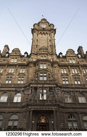 Stock Photograph - Low angle view of Balmoral Hotel and clock tower; Edinburgh, Scotland. Fotosearch