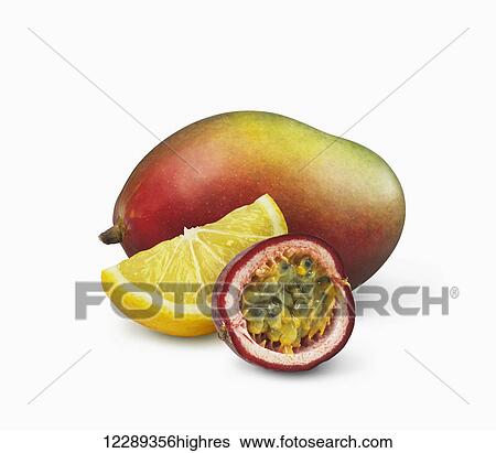 Stock Photograph - Mango, lemon and passion fruit; Toronto, Ontario, Canada. Fotosearch