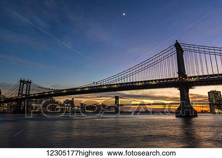 Manhattan and Brooklyn Bridges at twilight; New York City, New York, United States of America View Large Photo Image Stock Photograph - Manhattan and Brooklyn Bridges at twilight; New York City, New York, United States of America. Fotosearch
