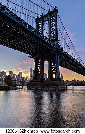 Manhattan Bridge and NYC skyline at sunset, Brooklyn Bridge Park; Brooklyn, New York, United States of America View Large Photo Image Stock Photograph - Manhattan Bridge and NYC skyline at sunset, Brooklyn Bridge Park; Brooklyn, New York, United States of America. Fotosearch