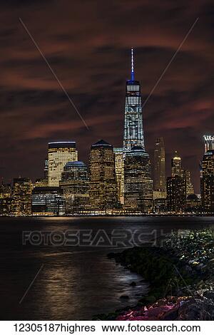 Stock Photograph - Manhattan skyline at twilight, Liberty State Park; Jersey City, New Jersey, United States of America. Fotosearch