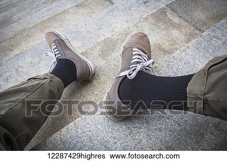 Man's legs and feet on the steps of a concrete building; Hartford, Connecticut, United States of America View Large Photo Image Stock Photograph - Man's legs and feet on the steps of a concrete building; Hartford, Connecticut, United States of America. Fotosearch