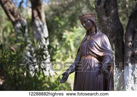 Stock Photograph - Mary's house, with a statue of Mary, mother of Jesus; Ephesus, Turkey. Fotosearch