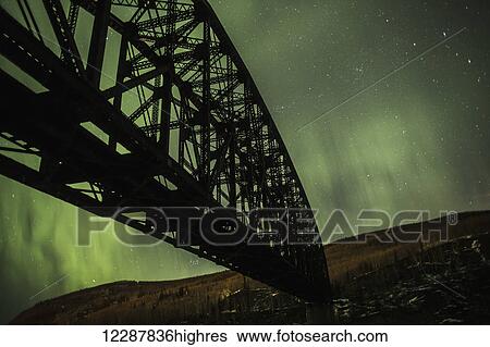 Mears Memorial bridge and Northern lights; Alaska, United States of America View Large Photo Image Stock Photograph - Mears Memorial bridge and Northern lights; Alaska, United States of America. Fotosearch