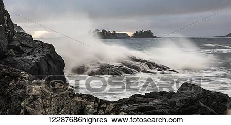 Mist in the air as waves crash against the rocky shore; Tofino, British Columbia, Canada View Large Photo Image Stock Photograph - Mist in the air as waves crash against the rocky shore; Tofino, British Columbia, Canada. Fotosearch