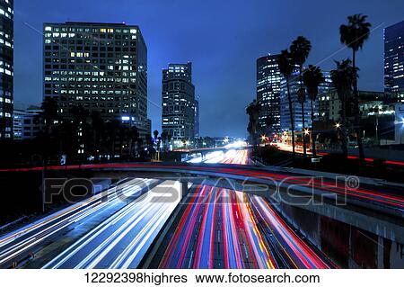 Stock Photograph - Modern Urban City at Sunset. Fotosearch