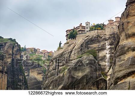 Stock Photograph - Monastery on the edge of a cliff; Meteora, Greece. Fotosearch