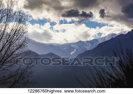 Stock Photograph - Mount Olympus, the highest mountain in Greece, located in the Olympus Range on the border between Thessaly and Macedonia; Greece. Fotosearch
