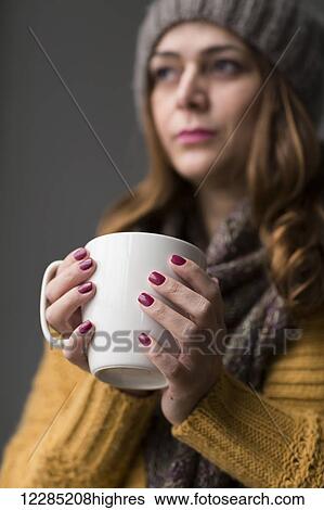 Nicaraguan woman holding a cup of tea; Toronto, Ontario, Canada View Large Photo Image Stock Photograph - Nicaraguan woman holding a cup of tea; Toronto, Ontario, Canada. Fotosearch
