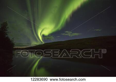 Northern Lights (aurora borealis) over the Pelly River; Ross River, Yukon, Canada View Large Photo Image Stock Image - Northern Lights (aurora borealis) over the Pelly River; Ross River, Yukon, Canada . Fotosearch