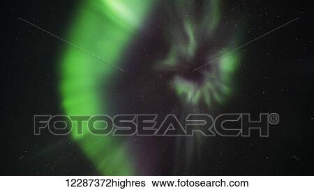 Stock Photograph - Northern Lights (aurora borealis); Yukon, Canada. Fotosearch