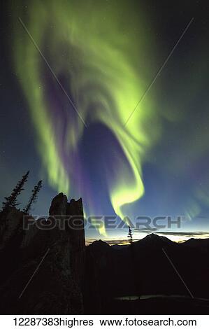 Stock Photograph - Northern Lights (aurora borealis); Yukon, Canada. Fotosearch