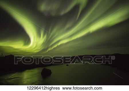 Northern Lights, or Aurora Borealis, glowing over a stream; Iceland View Large Photo Image Stock Photograph - Northern Lights, or Aurora Borealis, glowing over a stream; Iceland. Fotosearch