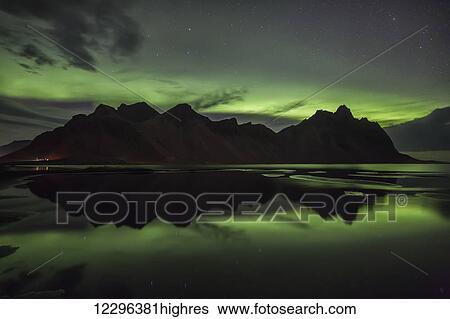 Stock Photograph - Northern Lights over Vestrahorn, Southern Iceland; Vestrahorn, Iceland. Fotosearch