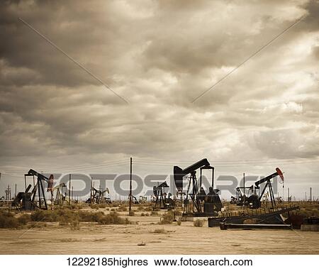 Stock Photograph - Oil Field in Desert. Fotosearch