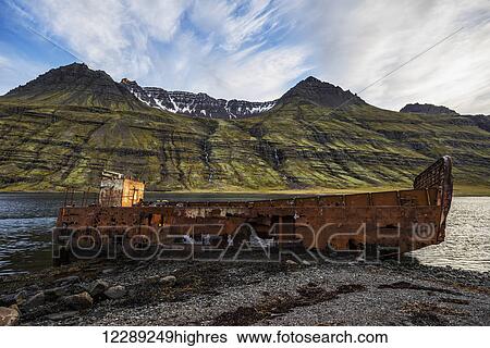 Old shipwreck along the water in Mjoifjordur, East Iceland; Iceland View Large Photo Image Stock Photograph - Old shipwreck along the water in Mjoifjordur, East Iceland; Iceland. Fotosearch