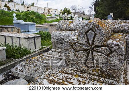 Old tombstones in a cemetery with a carved cross; Israel View Large Photo Image Stock Photograph - Old tombstones in a cemetery with a carved cross; Israel. Fotosearch