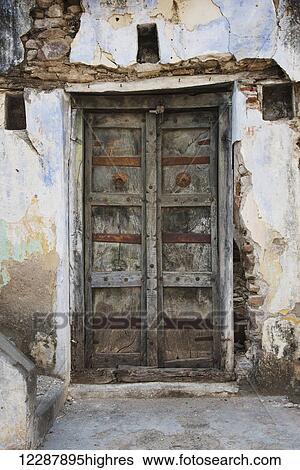 Stock Photograph - Old wooden door; Dharpatha Mal, Madhya Pradesh, India. Fotosearch