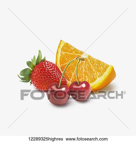 Orange wedge with cherries and a strawberry on a white background; Toronto, Ontario, Canada View Large Photo Image Stock Photograph - Orange wedge with cherries and a strawberry on a white background; Toronto, Ontario, Canada. Fotosearch
