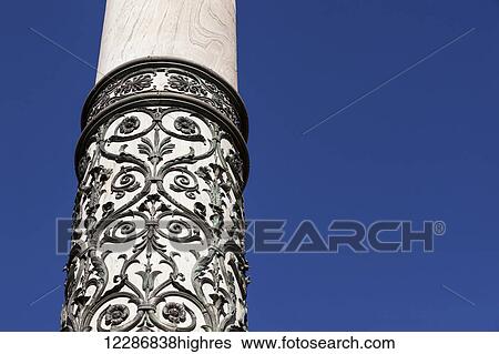 Stock Photograph - Ornate facade of a column; Rome, Italy. Fotosearch