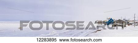 Stock Photography - Panorama of Barrow and the coast on an overcast winter day, North Slope, Arctic Alaska. Fotosearch