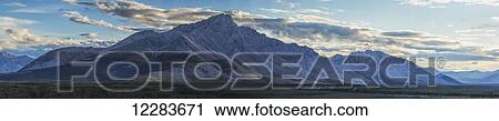 Stock Image - Panoramic image of Royal Mountain along the Wind River, Peel Watershed; Yukon, Canada. Fotosearch